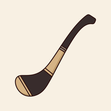 A close-up image of a traditional Hurling stick, known as a hurley, on a light-colored background