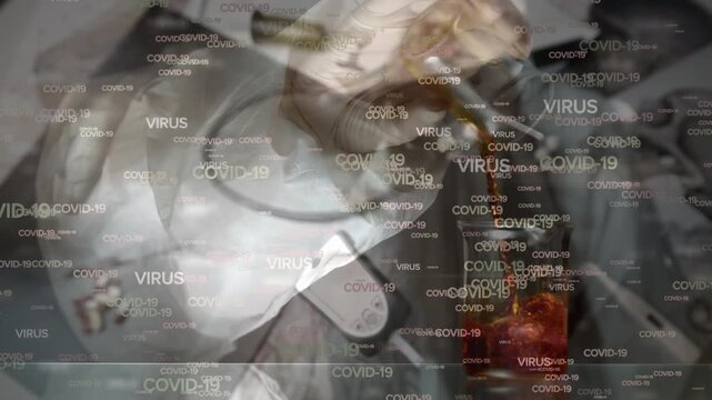 Animation of virus and covid texts and pulse oximeter over hands of lab worker