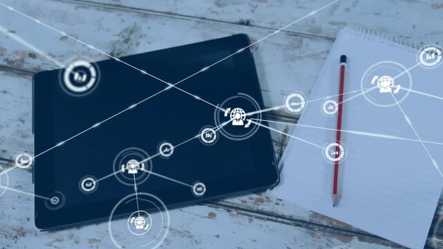 Black tablet emitting tech network, icon initiating visualizing data overlaying notepad