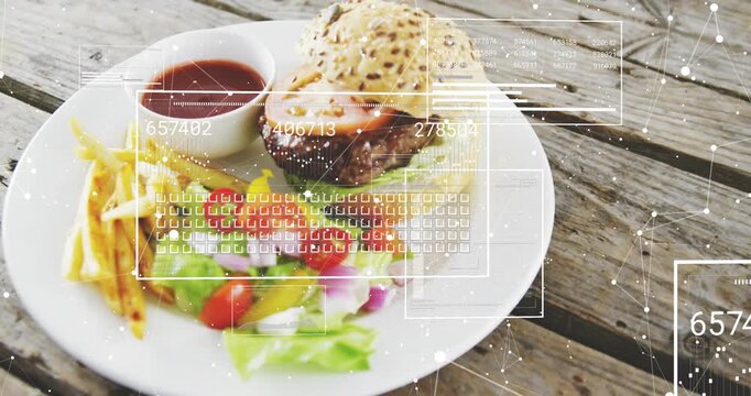 Vertical video: Fading HUD causing camera panning on wood table, showing burger plate with fries