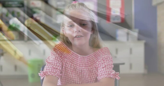 Student replying to camera cue in school, speaking, pencil overlay sliding partially obscuring face