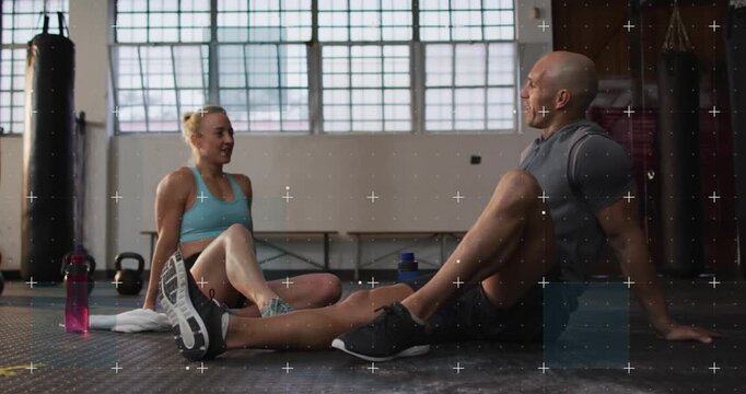 Woman trainee initiating high-five with male coach after workout live rep count pulsing above hands