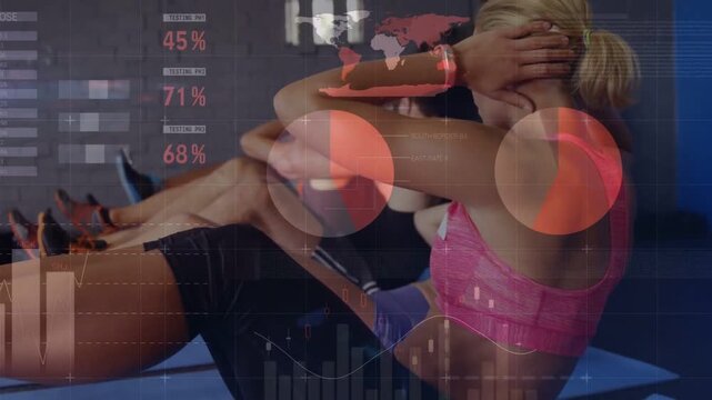 Lead woman initiating crunches on blue mats, lifting torso, updating HUD charts for training