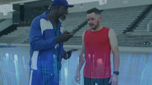 Vertical video: Tapping phone, blue tracksuit coach showing timing at stadium, athlete in red top