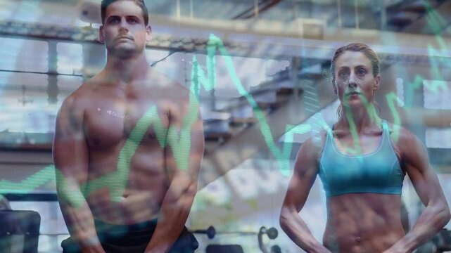 Lifting kettlebells shirtless man and woman in teal bra matching rows at gym tracking green graph