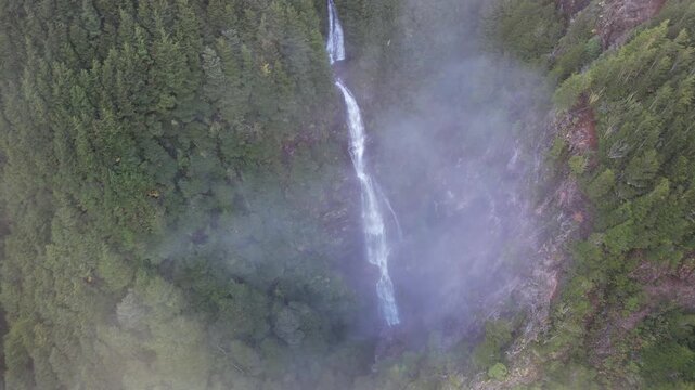 Aerial shot of a waterfall and trees