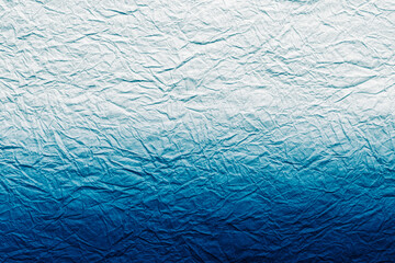 しわの入った和紙 白と濃い青のグラデーション