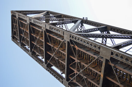 Raised steel drawbridge against blue sky in Chicago, Illinois