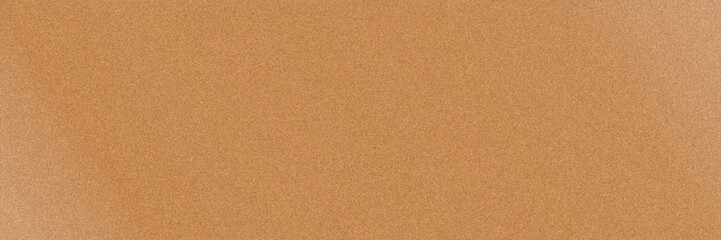 Fototapeta premium Uniform ochre grain texture with an even warm tone provides a versatile, rustic backdrop ideal for print materials, packaging designs, craft branding, and organic themed visuals.