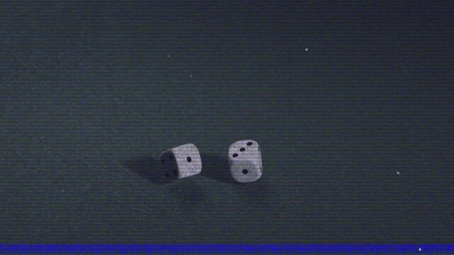 Animation of play screen over dice on game table