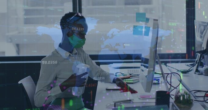 Financial data processing over african american woman cleaning her desk with disinfectant at office