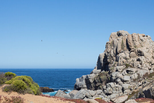 Granite rock formation and Pacific Ocean view at Piedra del Trueno peninsula, Punta de Tralca Chile