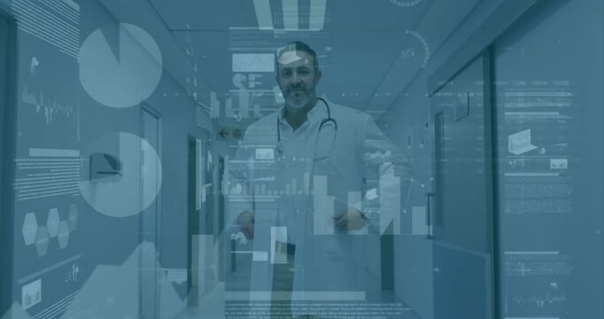 Animation of statistical data processing over portrait of male doctor smiling at hospital