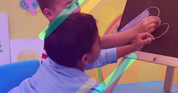 Children drawing on chalkboard, colorful shapes animation over classroom background