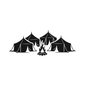 A group of camping tents and a campfire, symbolizing outdoor adventure and nature exploration