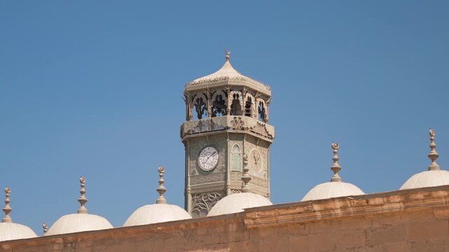 Clock tower and courtyard architecture inside Mohamed Ali Mosque complex