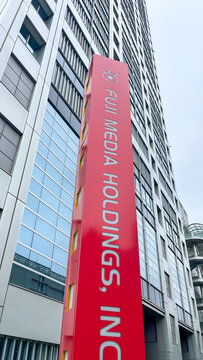 Fuji Media Holdings, Inc. logo sign at the corporate headquarters office building in Odaiba, a major Japanese media company - Tokyo, Japan, September 23, 2024