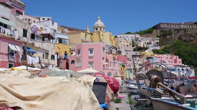 Traditional fishing harbor in the colorful village of Procida island