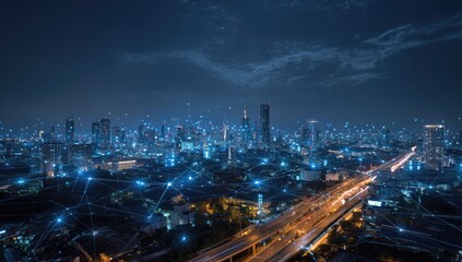 Obraz premium Futuristic city illuminated at night with glowing digital network overlay