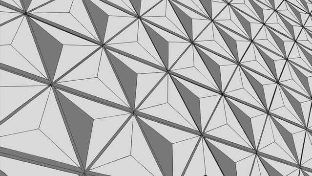 Geometric metal framework forming a striking modern architectural facade under natural lighting
