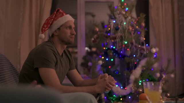 People celebrate New Year's and Christmas in a cozy home.
