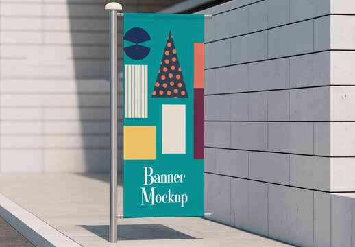 Outdoor Vertical Banner Mockup on Metal Pole with Modern Stone Wall Background