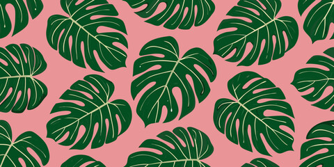 A seamless pattern of vibrant green monstera leaves on pink © Mithun