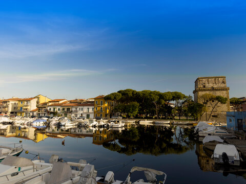 Matilde Tower in Viareggio with reflection water boats Tuscany