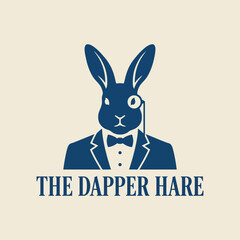 Fototapeta premium This unique logo features a dapper hare dressed in a tuxedo and monocle, presenting a whimsical and classy representation, perfect for fun and stylish branding.