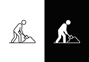 A person is digging in the ground with a shovel outdoors. © Matloob