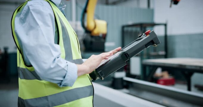 Engineering, controller and robotics with hands in workshop for industrial, automation and inspection. Manufacturing, technician and machinery with person in factory for safety and production line