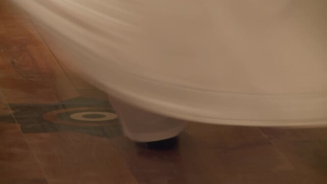 Whirling Dervish's Flying White Robe and Bare Feet