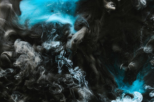 Abstract colorful blue smoke on black background. Moving flow of paints, fluid liquid art, space sky