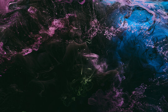 Luxurious abstract dark background. Explosive colors wallpaper, outer space pattern. Dynamic paint backdrop.
