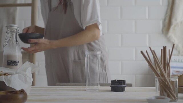Preparing homemade hazelnut milk in a cozy kitchen