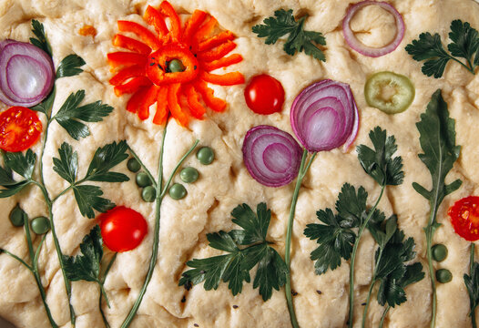 Floral focaccia bread art with vegetables, Italian bake