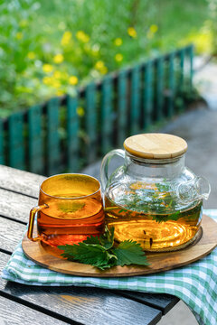 Herbal detox tea in glass teapot for natural care