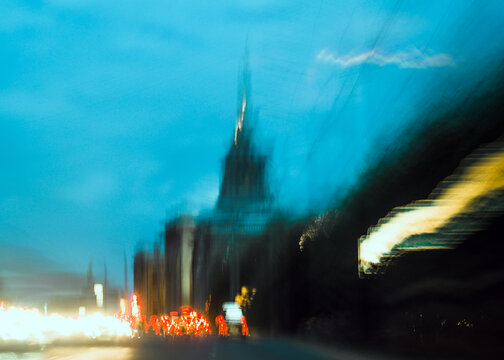 Night city street with motion blur and bright lights