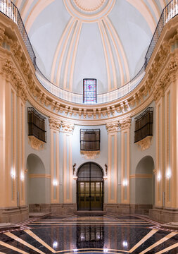 Restored monastery basilica interior with marble floor