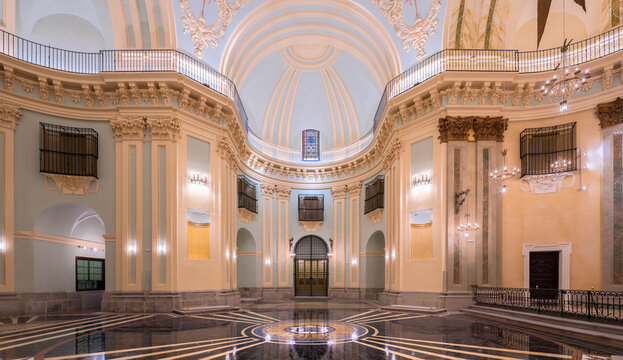 Restored monastery basilica interior with marble floor