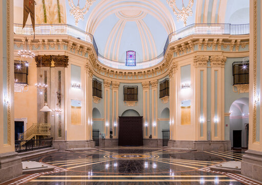 Restored monastery basilica interior with marble floor