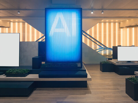 Modern retail space with digital displays and seating