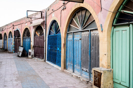 Old Moroccan doors and arches along a street in Essaouira