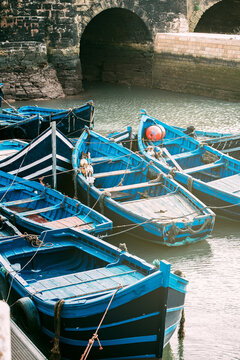Anchored fishing boats in Essaouira harbor, Morocco