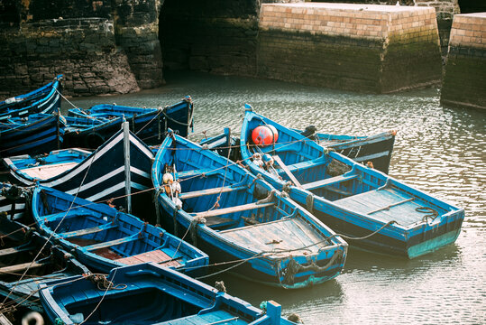 Anchored fishing boats in Essaouira harbor, Morocco