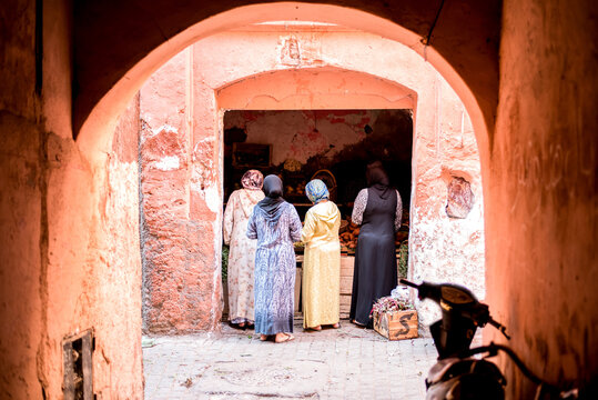 Group of Arabic women shopping at Marrakech street market