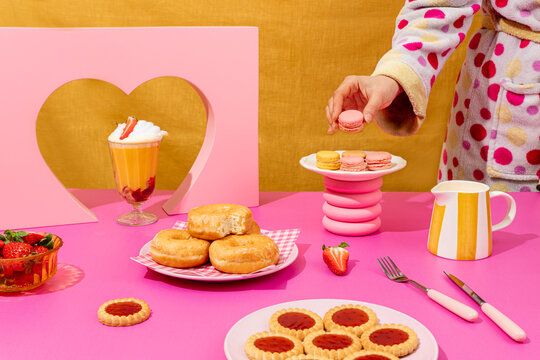 Colorful dessert arrangement with macaroons and pastries