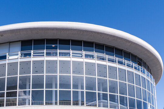 Modern glass facade detail of a curved contemporary building