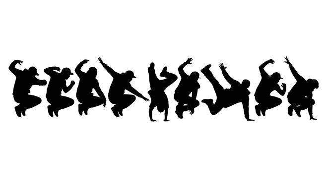 Silhouette of Breakdancers Performing Dynamic Moves.