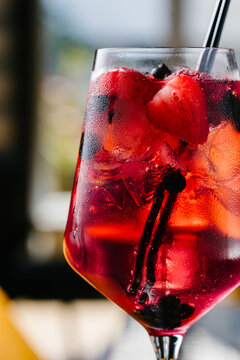 Aperol Berry Spritz cocktail with Prosecco, soda and ice